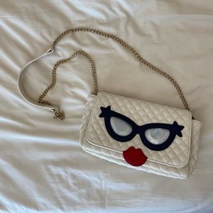 Adorable quilted sassy face purse!